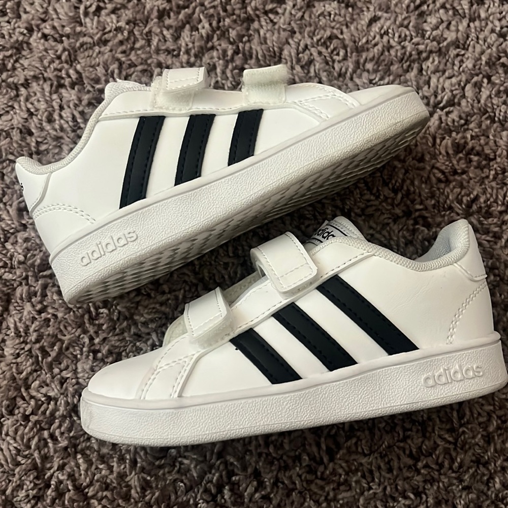 Black & white adidas shoes